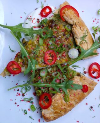 Leek + Potato Galette with the flakiest, most awesome pistachio crust (garnished with pink pepper, chili, arugula, + garlic yogurt) = all the feelz on this damn cold day!
